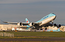 Korean Air's 747-8 Intercontinental rotates and climbs up on her deliv...
