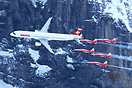 The five F-5E of the Patrouille Suisse and an Airbus A321 of Swiss per...