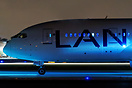 LAN's Blue mood lightening on display as flight 501 readys for a late ...