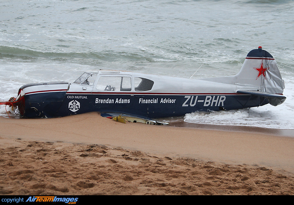 Just off the airport on the beach Yakovlev Yak-18T