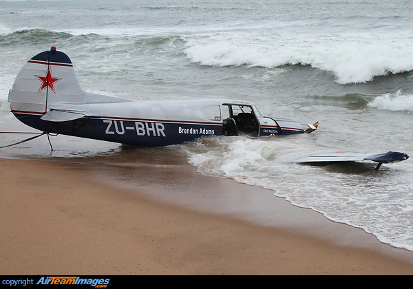 Just off the airport on the beach Yakovlev Yak-18T