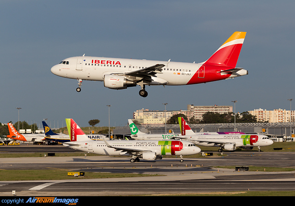 T2 visible on the background with 4 low cost airlines Airbus A319-111