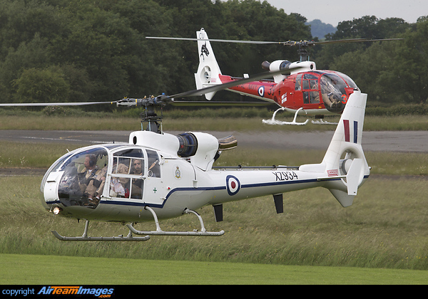 Still carrying it's former military identity, this Gazelle HT.3 now makes up part of the civilian Gazelle Squadron Display Team. Painted in the marks of 32 Squadron VIP, usually worn by Gazelle HCC.4s.
Gazelle G-CBSI/XX436 , another part of the Gazelle Squadron team is behind. Westland Gazelle HT.3