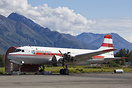 An Alaska Air Fuel DC-4 undergoing heavy maintenance outdoors at Palme...