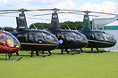 The Robinson helicopter range: R-22, R-44 and R-66 on display at Sywel...