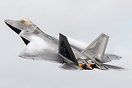 Lockheed Martin F22 Raptor take off and strong pull up, leaving conden...