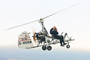 Ken Wallis happily flies along at 2,000ft with both legs dangling over...