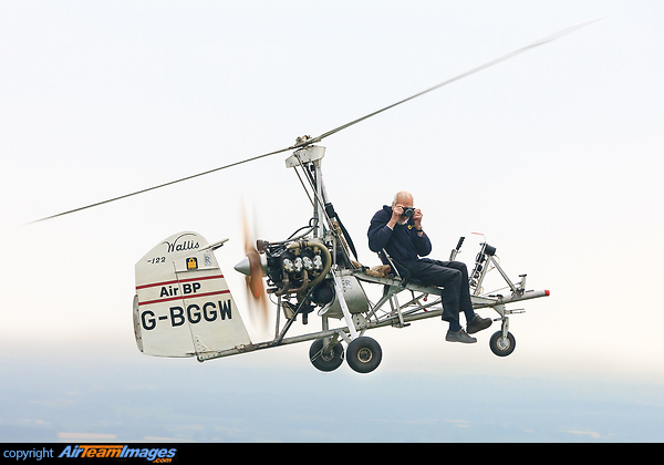 Ken Wallis happily flies along at 2,000ft with both legs dangling over one side of his little aircraft. Wallis WA-112