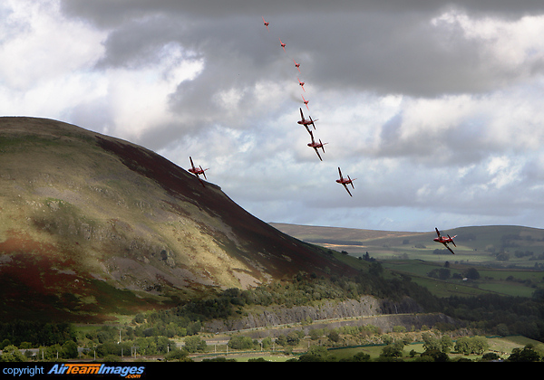 The Red Arrows seen here flying Low Level between the mountains of Cumbria heading to Newcastle's Great North Run to perform a display Red Arrows