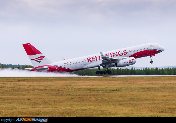 Departure during rainy weather Tupolev Tu-204-100B