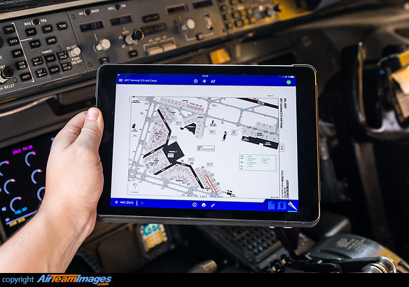 EFB (Electronic Flight Bag) in operation, showing the ground chart for Delhi Airport. The device is an iPad. Electronic Flight Bag