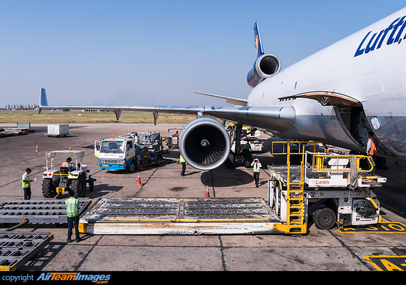 Ground ops in progress - loading and refueling. McDonnell Douglas MD-11F