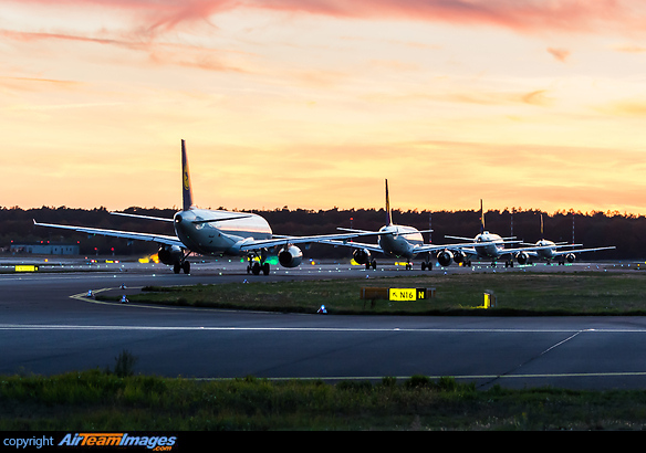 Several Lufthansa narrow body Airbus aircraft are waiting for departure from runway 18. Airbus A321-231