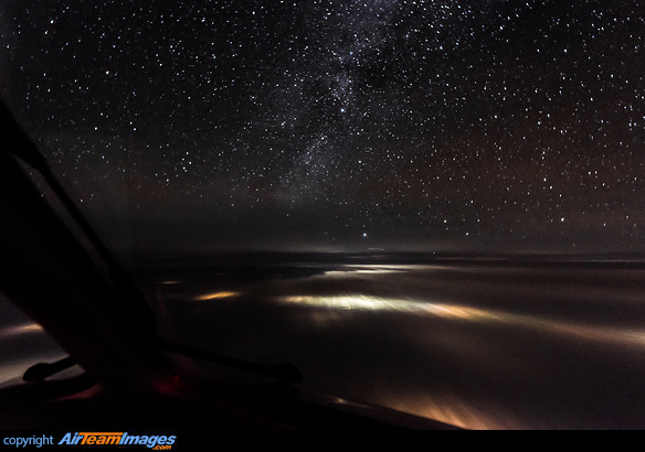 Flying towards the Milky Way with some Central Chinese cities passing below just south of Chengdu. McDonnell Douglas MD-11F