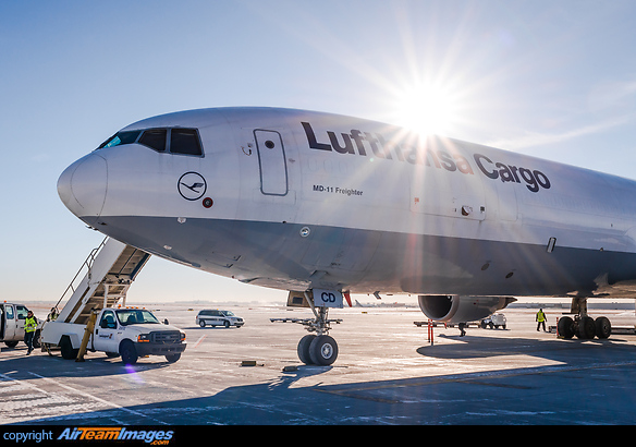On the cargo ramp after a charter flight full of cars for winter testing, ready for unloading. McDonnell Douglas MD-11F