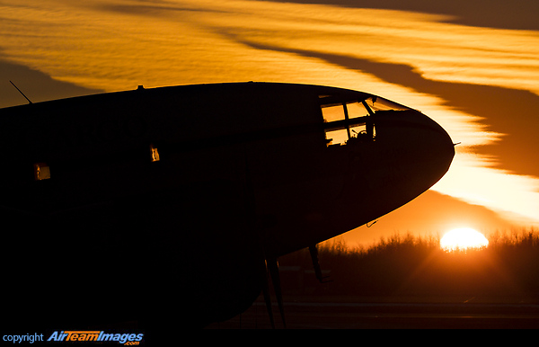 The winter sun rises at a late almost 10am in Fairbanks on this freezing morning met be an Everts C-46 70 years old and still going strong. Curtiss C-46D Commando