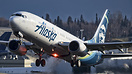 An Alaskan Airlines 737-890 departs for Seattle from Anchorage.