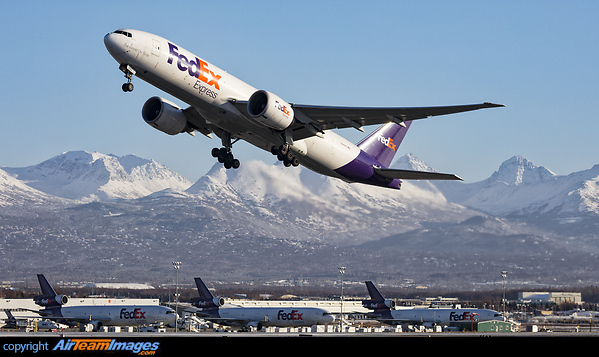 A Fedex dominated flightline at Anchorage just another routine day in this massive freight hub of Fedex's operations. Boeing 777-F28