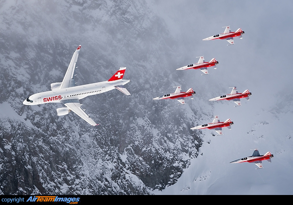 Swiss CS100 and the Patrouille Suisse in action over St. Moritz during the Ski World Championships Bombardier CS100