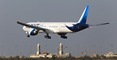 Kuwait Airways brand new Boeing 777 flares above a local mosque as it ...
