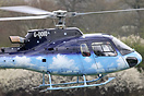 Nick Mason of Pink Floyd about to land in his superbly painted helicop...
