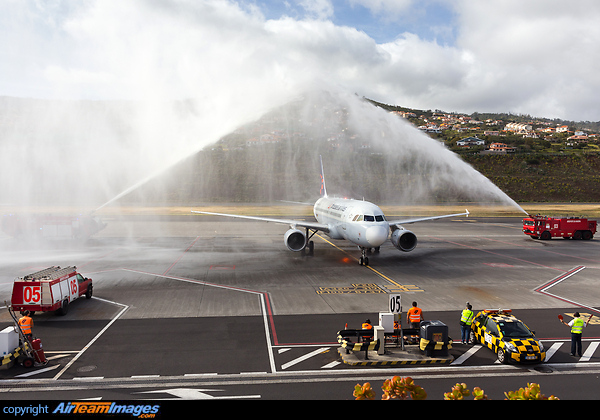 Brussels Airlines maiden flight to Madeira welcomed with a water canon. Airbus A319-112