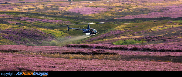 Heli Air Robinson R-44 seen here crop spraying in the Yorkshire dales Moorland Robinson R-44 Raven II