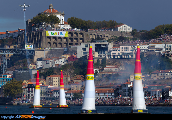 Red Bull Air Race 2017 in Porto / Gaia: The race track with Pete McLeod entering the loop. Zivko Edge 540
