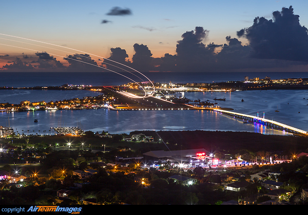 Long exposure of an Insel Air MD-83 taking off from SXM airport at dusk. St. Maarten Princess Juliana