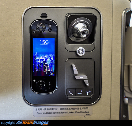 Cathay Pacific Airways Inflight Entertainment: dimmable reading light, video handset, seat controller. Airbus A350-941