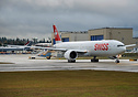 Swiss Air's latest Boeing 777-300ER on her delivery flight to Zurich, ...