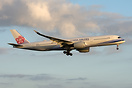 CI53 arriving from Brisbane in evening light to land on 23L.