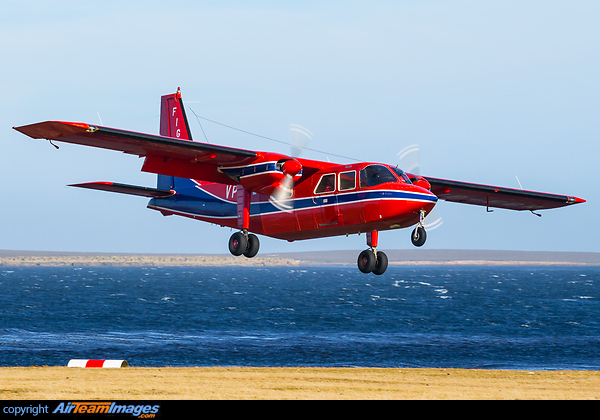 Swooping down to the grass strip on Bleaker Island in order to pick us up and return to Port Stanley. Britten-Norman BN-2 Islander