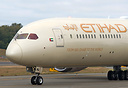 Closeup nose shot of Etihad's first production 787-10 airplane taxing ...
