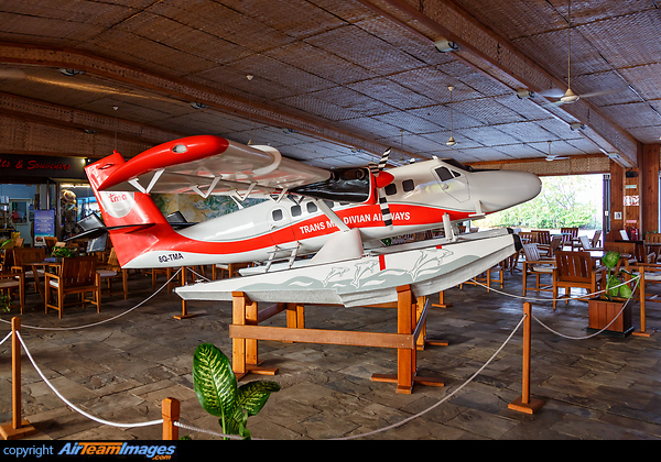 Model of a De Havilland Canada DHC-6-300 Twin Otter seaplane inside the terminal of Trans Maldivian Airways - TMA. Male Airport