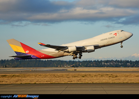 rotating in golden glow of the dusk Boeing 747-446F/SCD