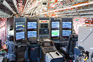 Flight engineers deck checking datas during demo