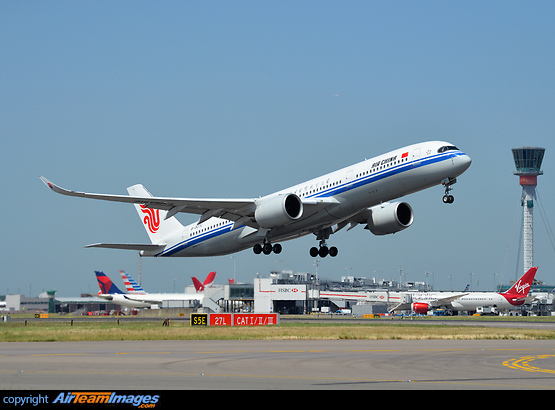 One of Air China's new A350s powers away from 09 right. Airbus A350-941