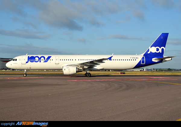 Holding short of runway 27 left before taxying to stand in Terminal 4. Airbus A321-211