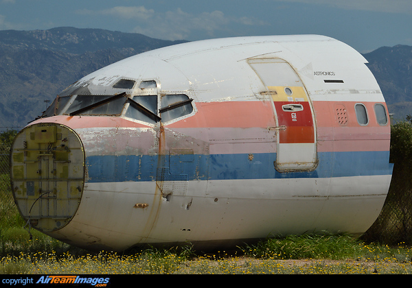 Nose section of this classic sits in the ARM yard just outside Davis Monthan AFB, note the Continental L1 door . Boeing 727-222