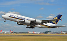 One of Singapore Airlines newest A380s climbs away from 27 left.