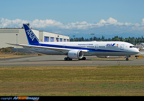 ANA's latest 787-9 entering active runway with Boeing factory in background, to take off on her delivery flight to Haneda Intl, Japan Boeing 787-9 Dreamliner