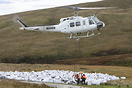 Heli-lift-Services seen here lifting bags of Heather to replant and ge...