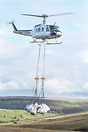 Heli-lift-Services seen here lifting bags of Heather to replant and ge...