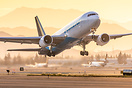 Amazon Prime Air taking off during sunrise at ONT