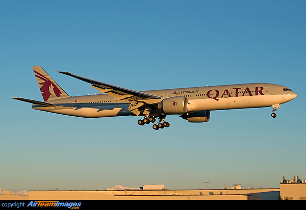Landing in warm glow of golden sunset at the golden hour Boeing 777-3DZ/ER