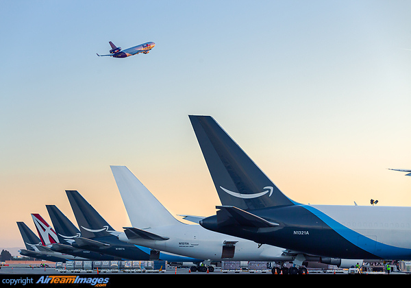 FedEx MD-11F departing ONT behind a tail of Amazon Prime 767's Ontario International Airport