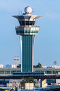 Air Traffic Control Tower from an elevated spot located airside with O...