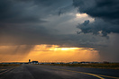 Under the storm around sunset.