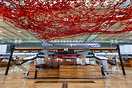 The airport's centrepiece is "Flying Carpet", a 999-metre long red alu...